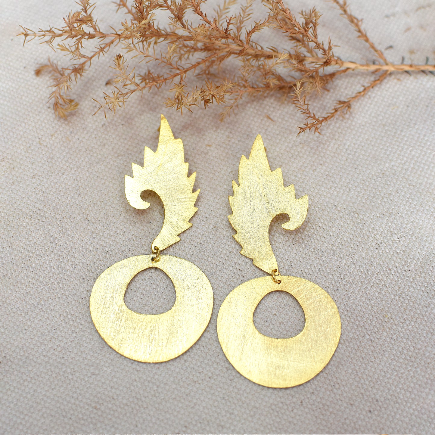 Circular Drama Of Leaf Earrings