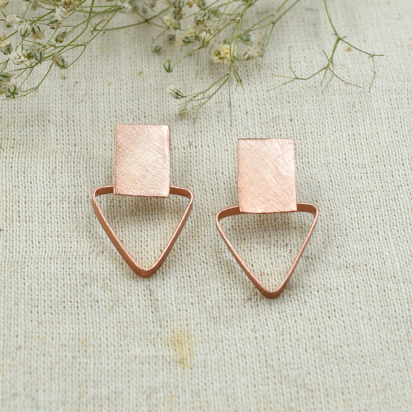 Square Holding Triangle Stud Earrings