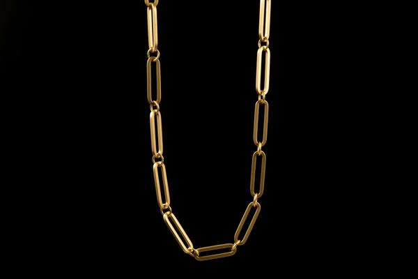 make a mordern brass Neck long chain with black background 